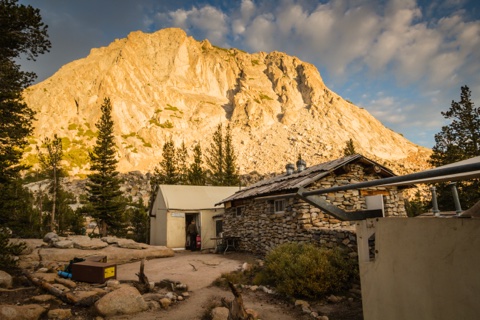 Fletcher Peak glowing at sunset over the dining hall.