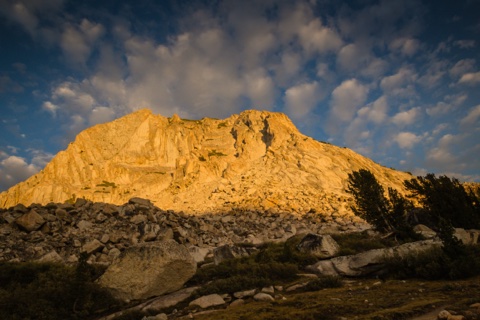 Fletcher Peak lit gold by the setting sun.